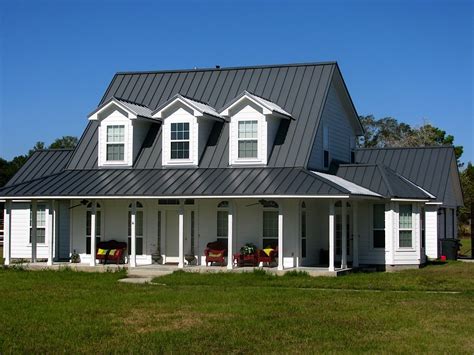 black metal roof ranch house|farmhouse with metal roof images.